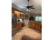 Beautiful kitchen features stainless steel appliances, granite countertops, and tiled flooring at 941 Elwood Ave, Englewood, FL 34223