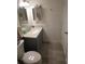 Bathroom with a white tub and shower combination, updated vanity with a gray cabinet at 10275 Euston Ave, Englewood, FL 34224