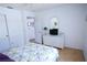 Bright bedroom featuring a dresser and closet, creating a comfortable and functional space at 10275 Euston Ave, Englewood, FL 34224