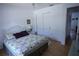 Bedroom features a closet and an open doorway for a spacious and inviting feel at 10275 Euston Ave, Englewood, FL 34224