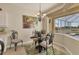 Dining area with view of the pool and golf course at 105 Westwind Dr, Placida, FL 33946