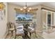 Dining area with a pool view through sliding glass doors at 105 Westwind Dr, Placida, FL 33946