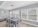 Dining room featuring an elegant table set and windows with views at 10500 Sherman St, Englewood, FL 34224