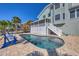 Resort-style pool with water views and outdoor seating, perfect for entertaining at 10500 Sherman St, Englewood, FL 34224