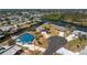 An aerial view of a single-story home in a waterfront neighborhood with canals at 1167 Delmar St, Englewood, FL 34224