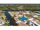 Aerial shot of waterfront home with dock, pool, and stunning canal views at 1167 Delmar St, Englewood, FL 34224