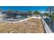 Scenic shot of backyard featuring a pool and canal with a boat lift, ideal for outdoor entertainment at 1167 Delmar St, Englewood, FL 34224