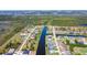 Aerial view of homes on canals, golf course and lakes with waterfront community at 1167 Rotonda Cir, Rotonda West, FL 33947