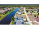 Aerial view of the homes on the canal with lake access and scenic views at 1167 Rotonda Cir, Rotonda West, FL 33947