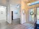 Foyer with tile floors, a bench, front door with glass, and views into other rooms at 1167 Rotonda Cir, Rotonda West, FL 33947