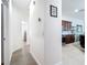 Hallway leads to the kitchen and other rooms of the house at 1167 Rotonda Cir, Rotonda West, FL 33947