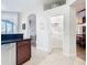Kitchen view showcasing a pantry, countertop, and connections to other living spaces at 1167 Rotonda Cir, Rotonda West, FL 33947