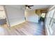 Bright and airy living room featuring sleek floors and a staircase with natural light coming in at 11750 Tempest Harbor Loop, Venice, FL 34292