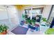 Cozy patio space with plants and bench, offers a relaxing outdoor space at 11750 Tempest Harbor Loop, Venice, FL 34292