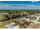 Aerial view showcases the beautiful community, landscaping and nearby creek at 13100 S Mccall Rd # 112, Port Charlotte, FL 33981