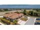 An eye-level exterior shot of a comfortable home with manicured front lawn at 13100 S Mccall Rd # 112, Port Charlotte, FL 33981