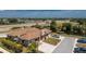An eye-level exterior shot of a comfortable home with manicured front lawn at 13100 S Mccall Rd # 112, Port Charlotte, FL 33981