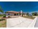 An eye-level exterior shot of a comfortable home with manicured front lawn at 13100 S Mccall Rd # 112, Port Charlotte, FL 33981