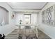 Bright home office space with white desk, chair, artistic décor, and recessed lighting at 13100 S Mccall Rd # 112, Port Charlotte, FL 33981