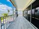 Relax on this expansive screened balcony with tranquil water views at 1400 Beach Rd # 2, Englewood, FL 34223