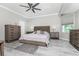 Well-appointed main bedroom with stylish furnishings and an abundance of closet space at 1400 Beach Rd # 2, Englewood, FL 34223