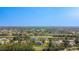 Expansive aerial view of the community, showcasing the neighborhood, lakes, and surrounding landscape at 16 Pine Valley Ct, Rotonda West, FL 33947