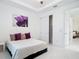 Light-filled bedroom featuring a closet and a stylish interior design, perfect for comfortable living at 16 Pine Valley Ct, Rotonda West, FL 33947