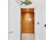 Elevator entrance with decorative fish art on the wall at 1953 Georgia Ave, Englewood, FL 34224