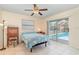 Bedroom with access to the screened-in patio and pool area at 2140 Carnac St, Port Charlotte, FL 33952