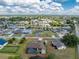 Aerial shot of the property, revealing the pool, storage shed, and overall neighborhood layout at 23347 Lehigh Ave, Port Charlotte, FL 33954