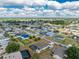 Overhead view highlighting property's yard, RV parking, pool, shed and neighborhood setting at 23347 Lehigh Ave, Port Charlotte, FL 33954