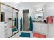 Bright bathroom with granite vanity, shower, and large mirror-door closet at 23347 Lehigh Ave, Port Charlotte, FL 33954
