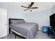 Bedroom featuring ceiling fan, bed, and closet at 23347 Lehigh Ave, Port Charlotte, FL 33954