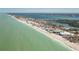 Panoramic aerial view of a condo community with direct beach access to the pristine white sand coastline and aqua blue water at 2450 N Beach Rd # 231, Englewood, FL 34223