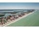 Aerial view of beach front property and condos for sale, adjacent to the Gulf at 2450 N Beach Rd # 231, Englewood, FL 34223
