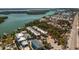 Waterfront property with private docks, lush landscaping, an outdoor pool, and access to the bay at 2450 N Beach Rd # 231, Englewood, FL 34223