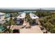 Newer, two-story condos with lush landscaping, palm trees and shared driveway in a waterfront community with gulf access at 2450 N Beach Rd # 231, Englewood, FL 34223