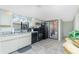 Functional kitchen featuring appliances and tile floors at 2450 N Beach Rd # 231, Englewood, FL 34223