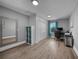 Well-lit office space featuring hardwood floors and neutral wall colors at 24805 Nova Ln, Punta Gorda, FL 33980
