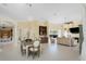 An open dining area connects to living area and features lots of space and bright natural light at 26 Saint Croix Way, Englewood, FL 34223