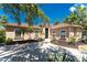 Charming single story home featuring a barrel tile roof and well manicured lawn at 26 Saint Croix Way, Englewood, FL 34223