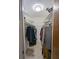 The walk-in closet features ample shelving and hanging space, providing convenient storage solutions at 2650 Colonade Ln, North Port, FL 34286