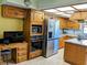This kitchen offers ample storage, stainless appliances, and an island, making it perfect for cooking and entertaining at 2650 Colonade Ln, North Port, FL 34286