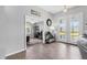 Inviting home foyer showcases tile flooring, neutral paint, and a view into the adjacent office space at 27 Sportsman Cir, Rotonda West, FL 33947
