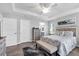 Stylish main bedroom featuring a neutral color palette, and a private ensuite at 27 Sportsman Cir, Rotonda West, FL 33947