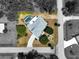 This aerial view reveals a home with a screened pool, well-kept landscaping, and a lengthy driveway at 270 E Wentworth St, Englewood, FL 34223