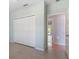 Bedroom with closet and view to a doorway at 270 E Wentworth St, Englewood, FL 34223