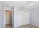 Bright bedroom with a ceiling fan and a closet at 270 E Wentworth St, Englewood, FL 34223