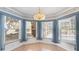 Cozy breakfast nook with large windows offering ample natural light and serene views at 270 E Wentworth St, Englewood, FL 34223