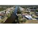 Waterfront homes along a canal, some with private docks and screened pools, in a residential neighborhood at 3246 Yukon Dr, Port Charlotte, FL 33948